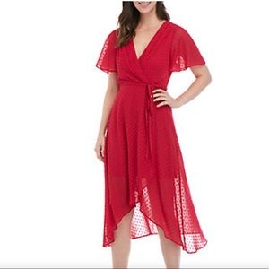 Sexy and ready for the holidays in this Vince Camuto Hi-low Wrap Midi Dress